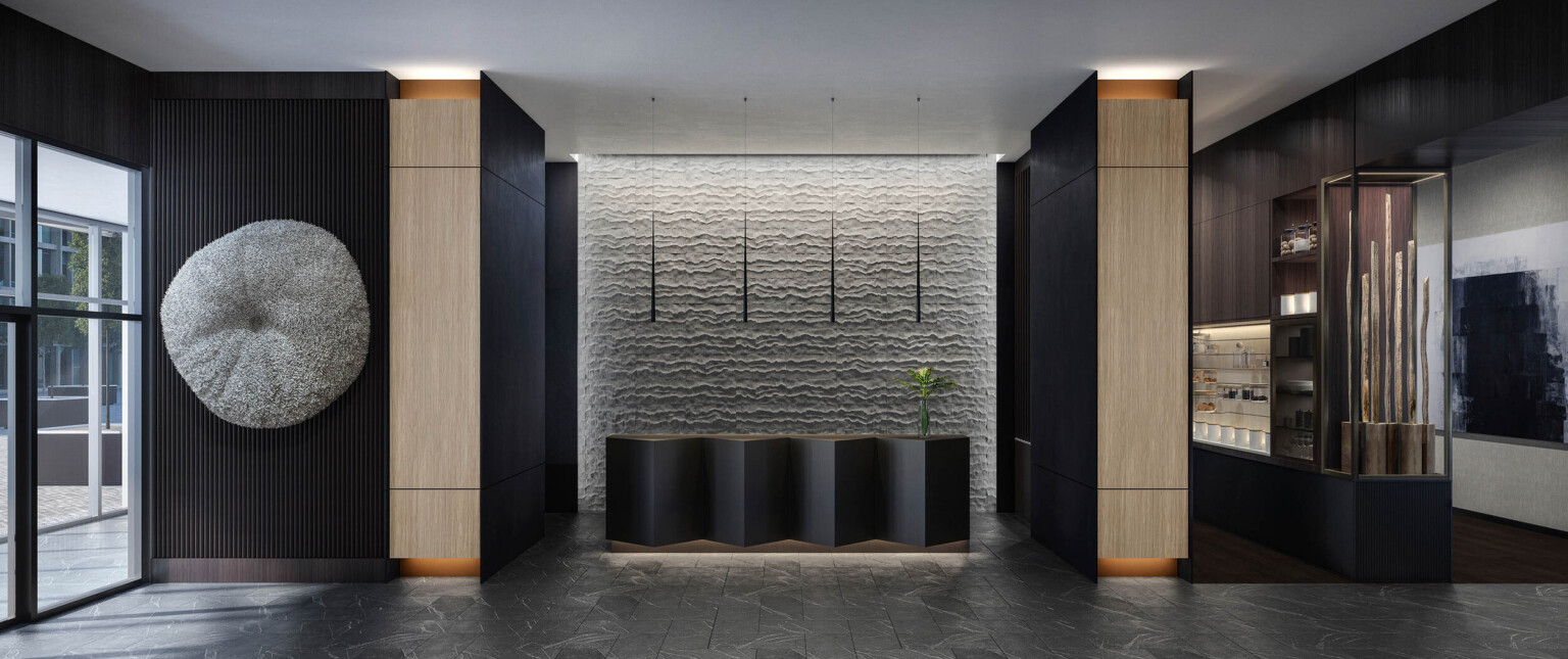 Recessed wood and black desk with black side walls and grey textural back accent wall. Wood accents on front of side walls following Marriott brand architecture
