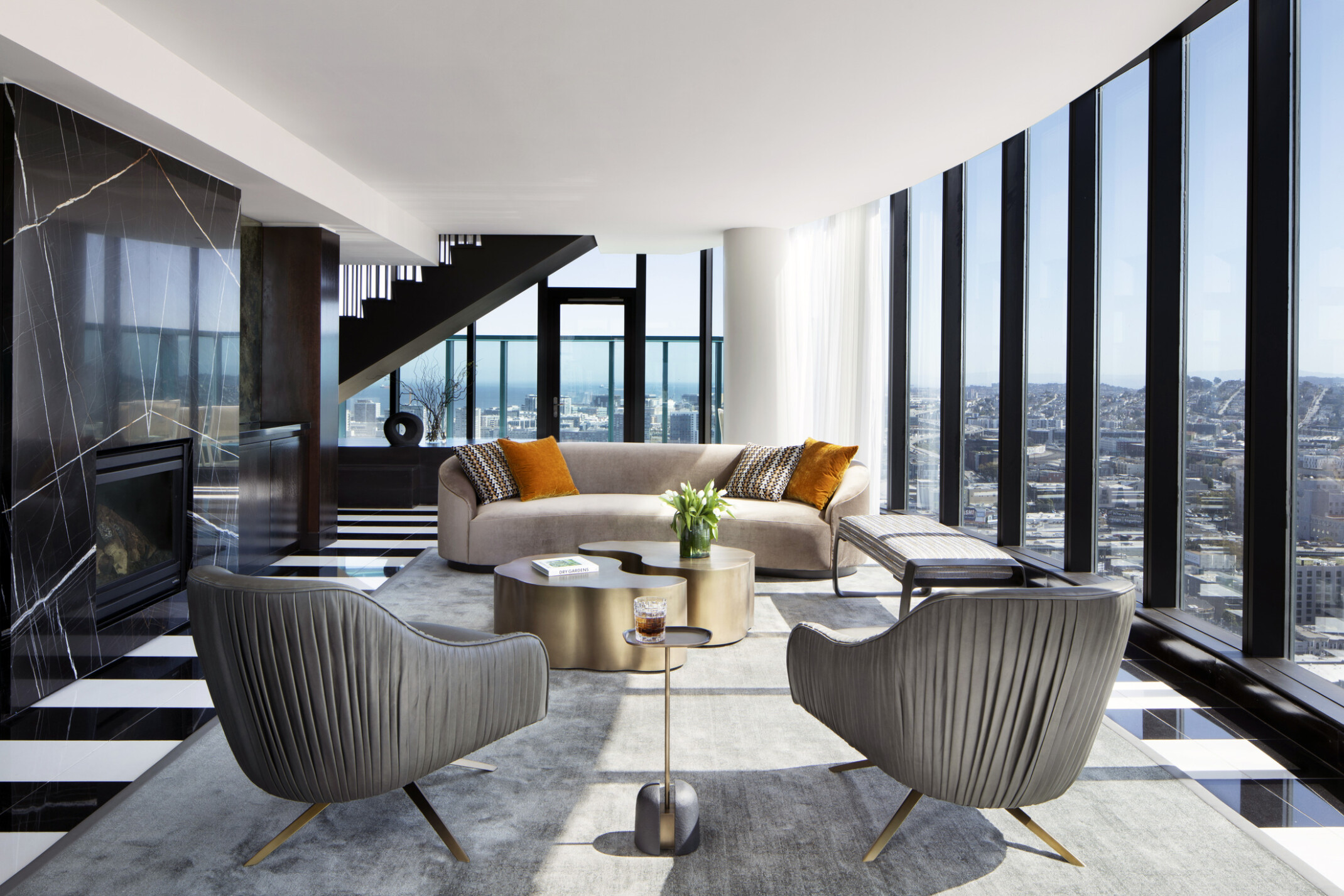 enclose rootfop view of San Fransisco from the airport, modern suite with seating and floor to ceiling windows