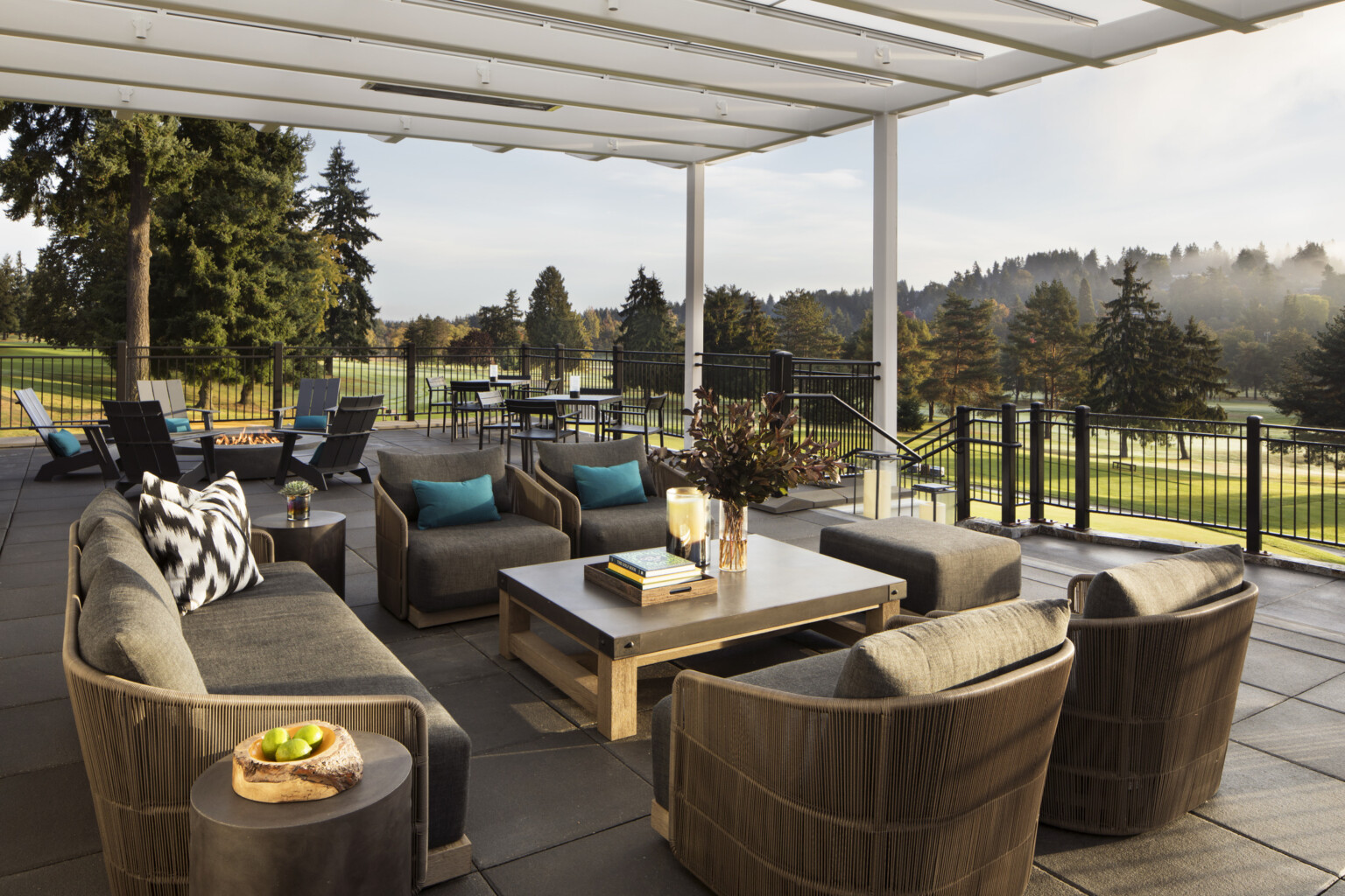 outdoor country club deck with lounge seating and views to golf course, golf course amenities