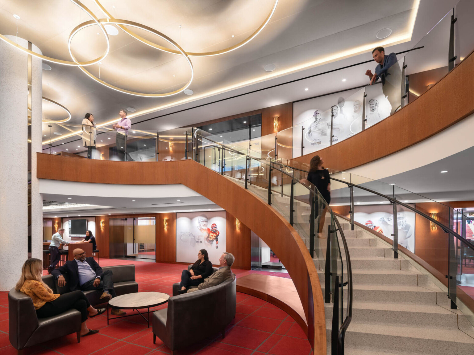 a curved grand stair connects guest lounges in Scholarship Tower