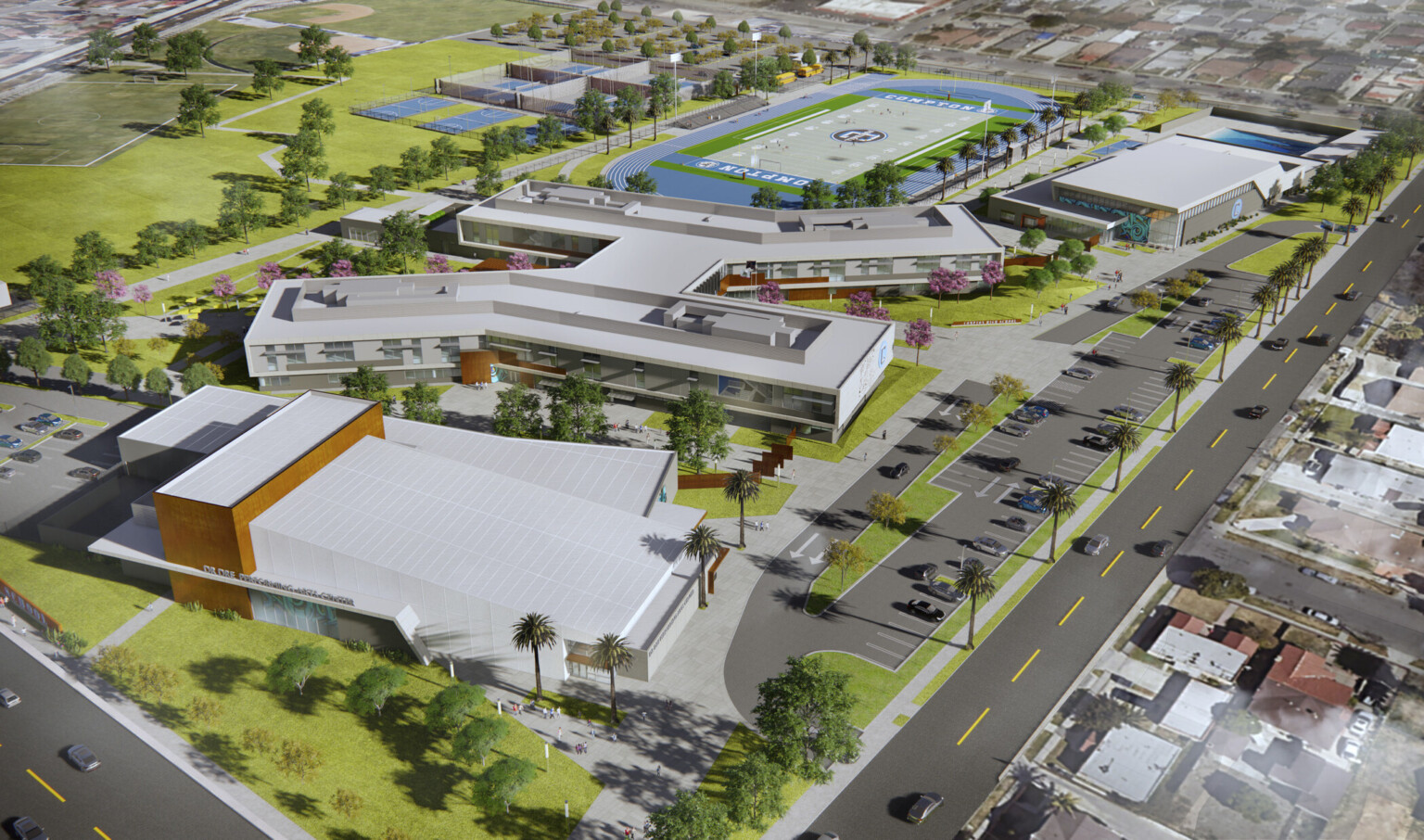 Aerial view of 3 building site. Football field, tennis courts, and pool to the back. Parking in front of main entrance Aerial view of 3 building site. Football field, tennis courts, and pool to the back. Parking in front of main entrance