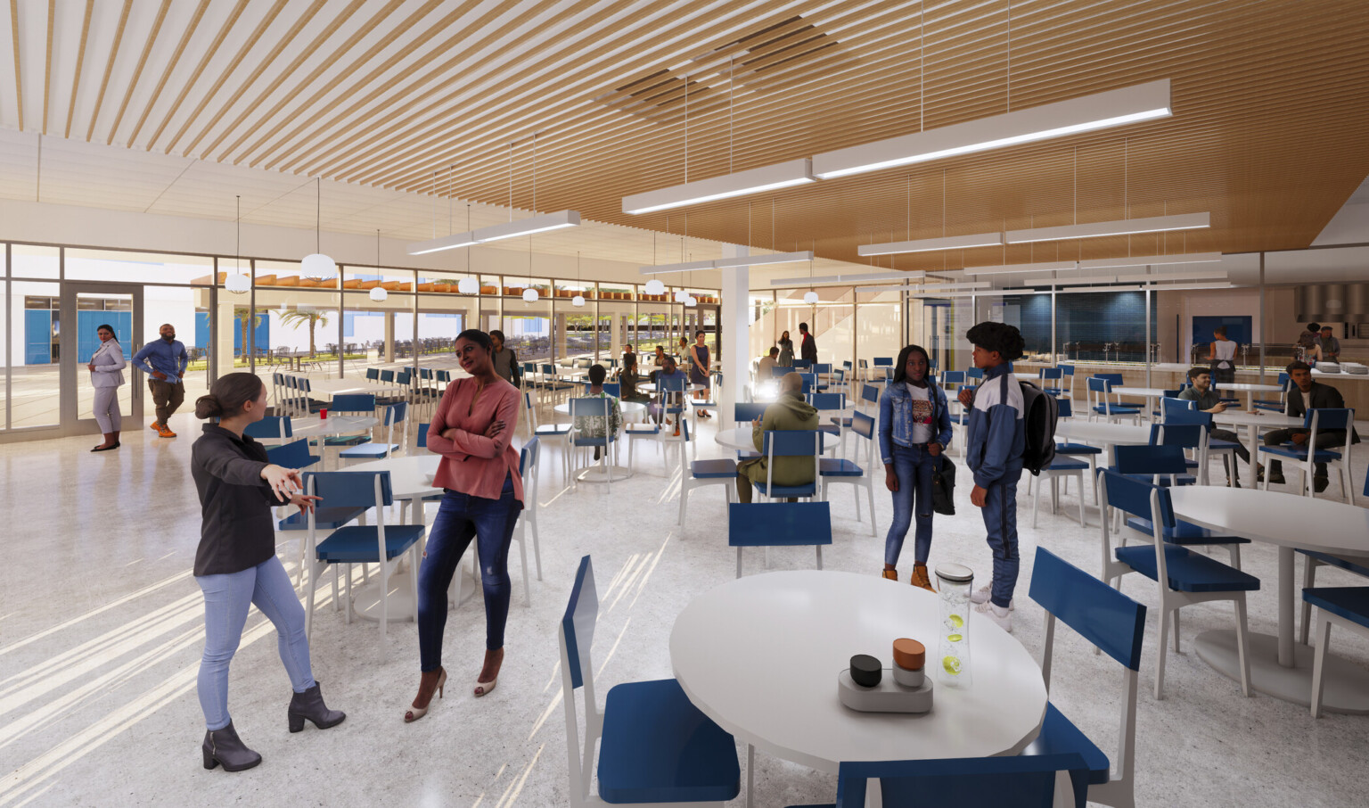 Cafeteria with wood slat ceiling detail with hanging light rods. More seating with pendant lights by floor to ceiling windows