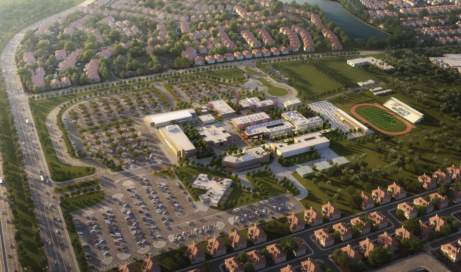 Aerial rendering of site with multiple buildings. Parking lot to the left, grassy areas and field to the right