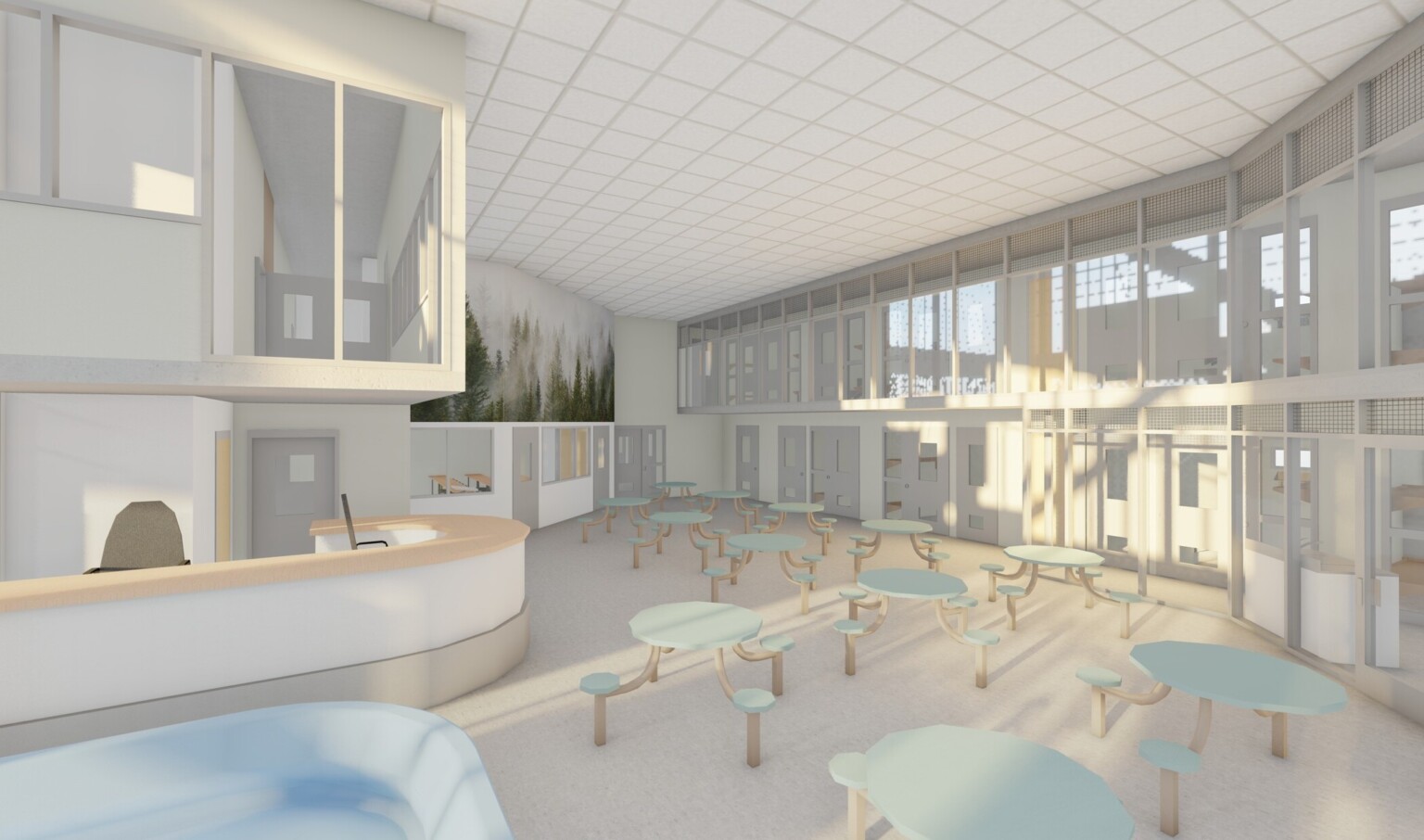 White room with 2 levels of grey doored cells over central area with tables and attached chairs. A mural of trees on top left