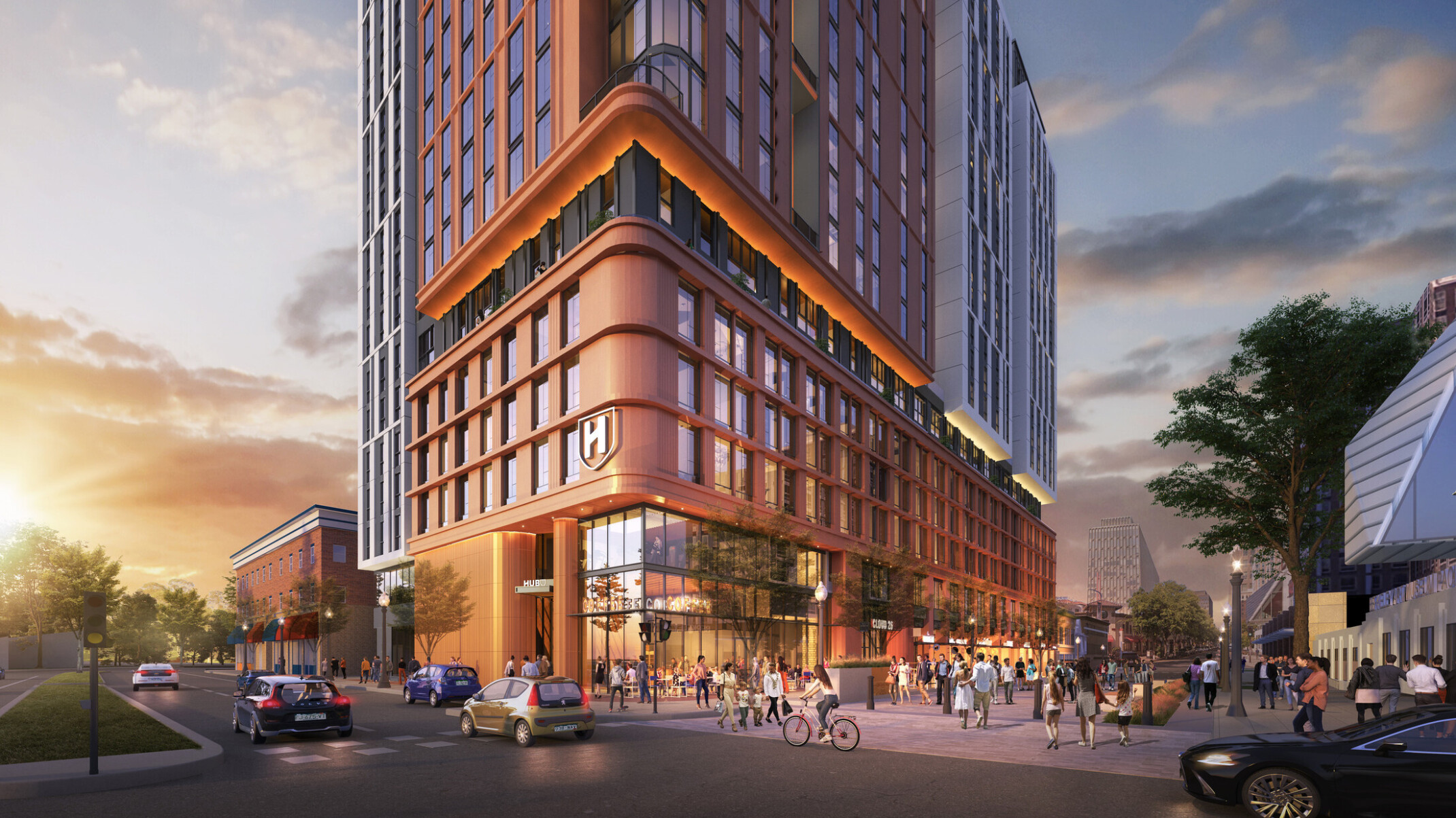 Rendering of a multistory building in shades of copper at the corner of a busy street and a pedestrian sidewalk