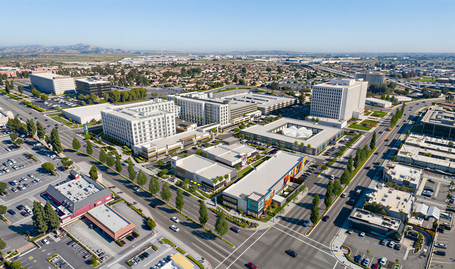 aerial view of a shopping center architectural rendering; busy streets, workplace and retail surround