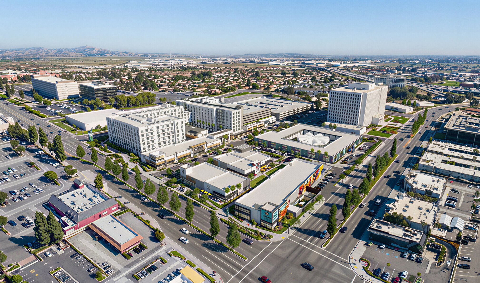 aerial view of a shopping center architectural rendering; busy streets, workplace and retail surround