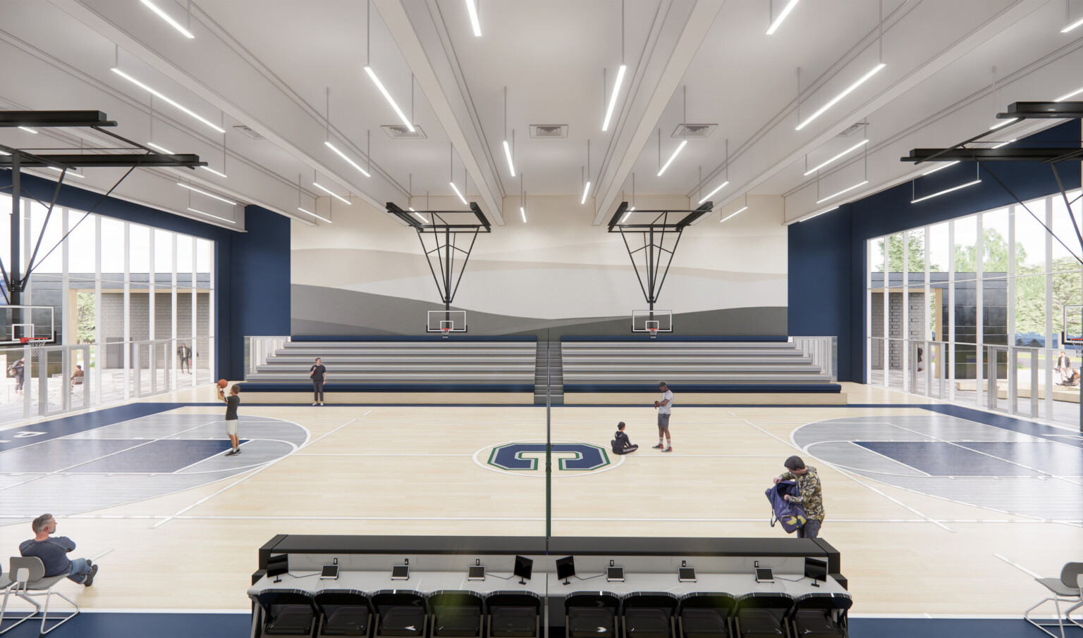 Chaparral High school gymnasium building; light wood floors; blue accents with basketball hoops suspended from the ceiling; sports facilities for k12