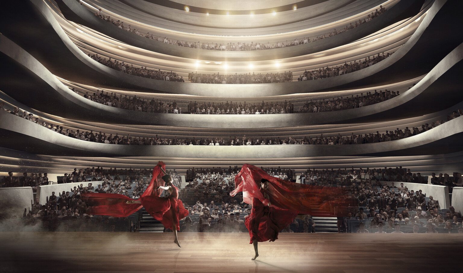 Upstage view of two dancers with red cloth lit from above center in front of audience at ground level and two balconies