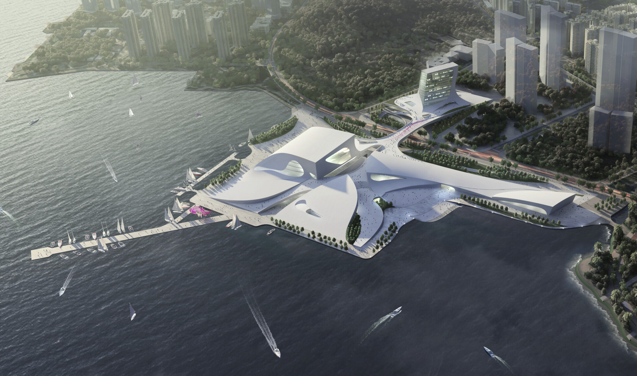 Aerial view of the sloping white Shenzhen Opera house between the Shenzhen Bay and Shekou Mountains