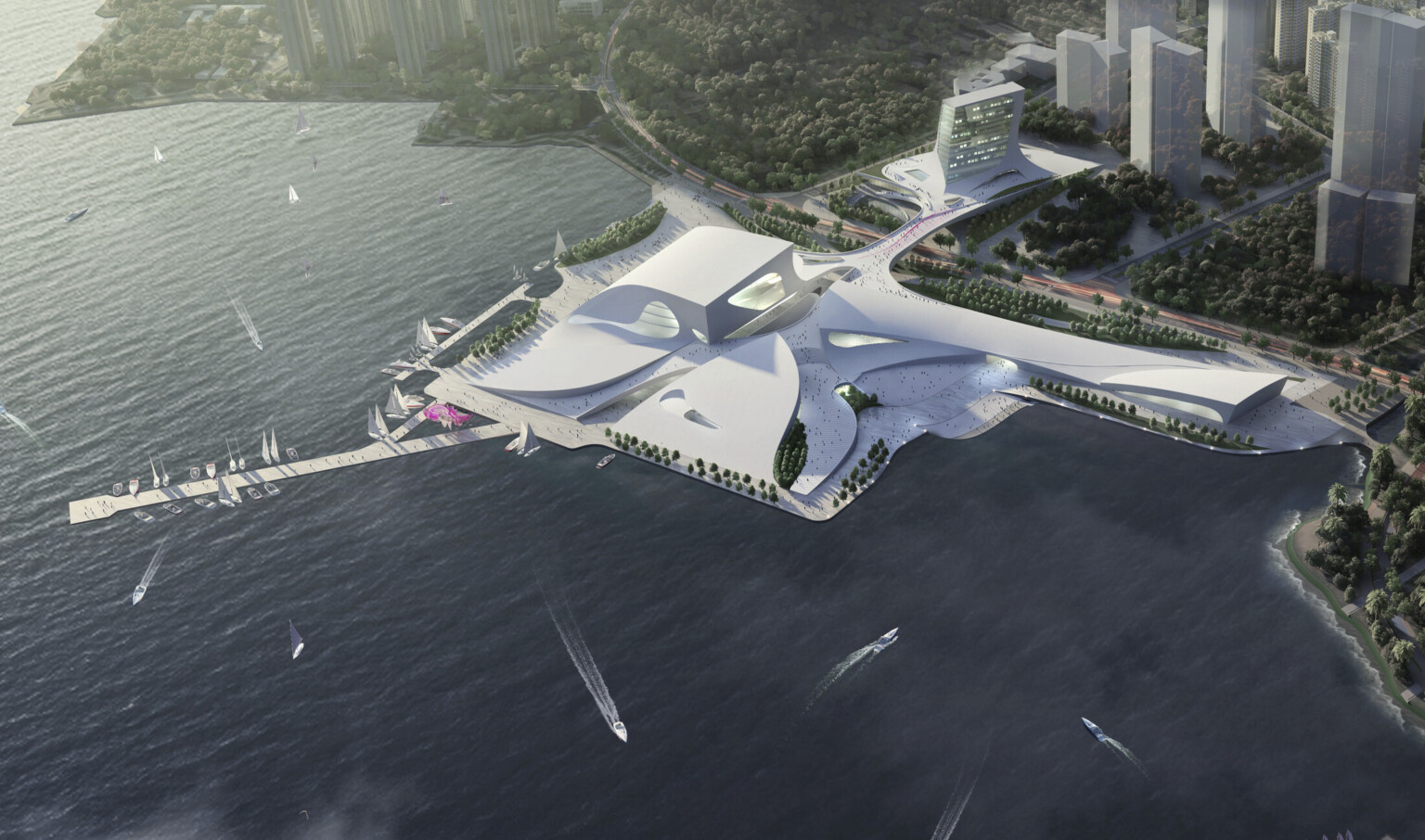 Aerial view of the sloping white Shenzhen Opera house between the Shenzhen Bay and Shekou Mountains