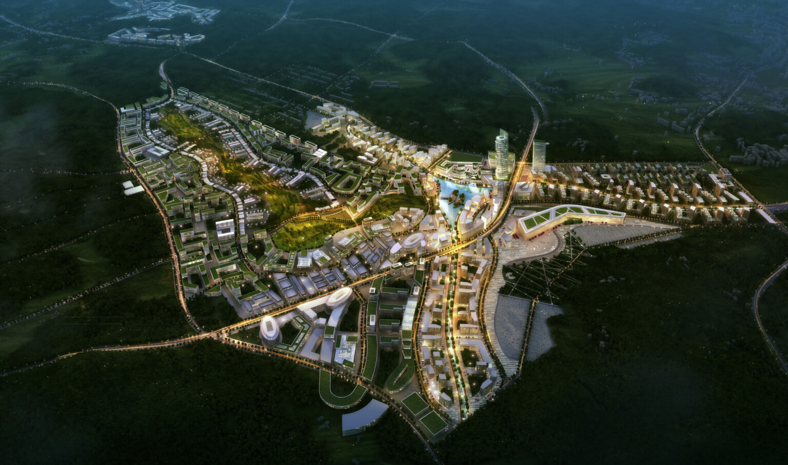 Smart City Korea illuminated at night with green roof buildings and a large park curving towards lake