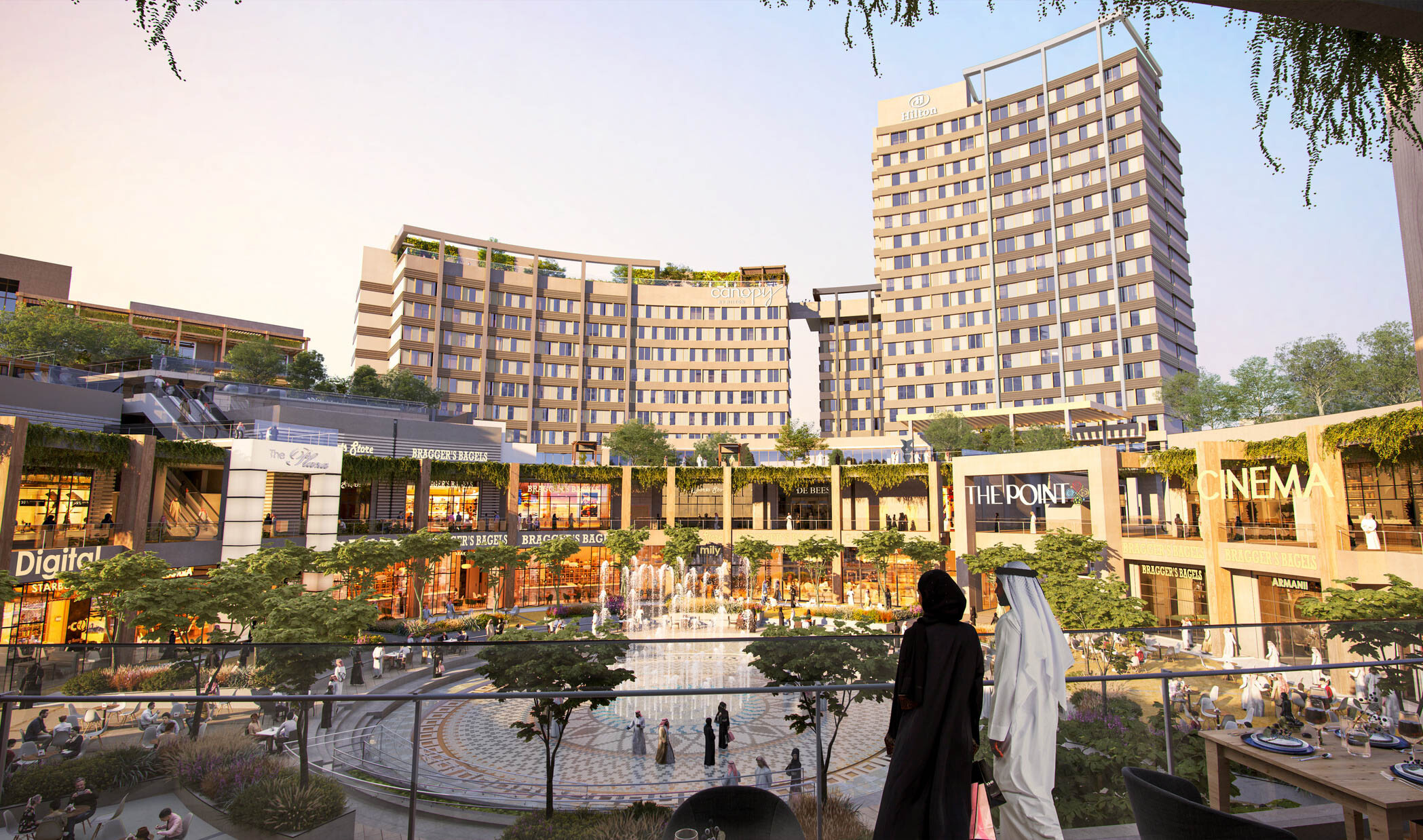 Upper level of outdoor shopping center with pathway down, seen in the evening. Multiple planters and green roofs along path