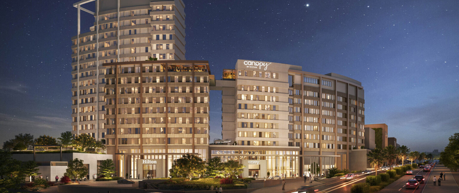 Night view of Hilton and Canopy by Hilton hotels