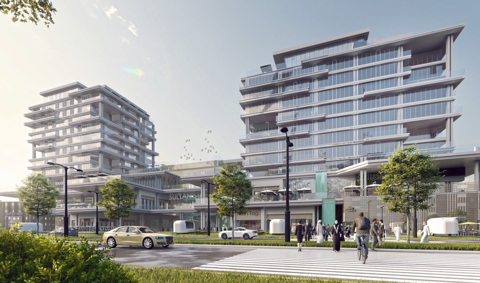 Sultan Street Plaza Mixed-Use development with 2 towers of apartments connected by walkways over 3 stories of shopping space
