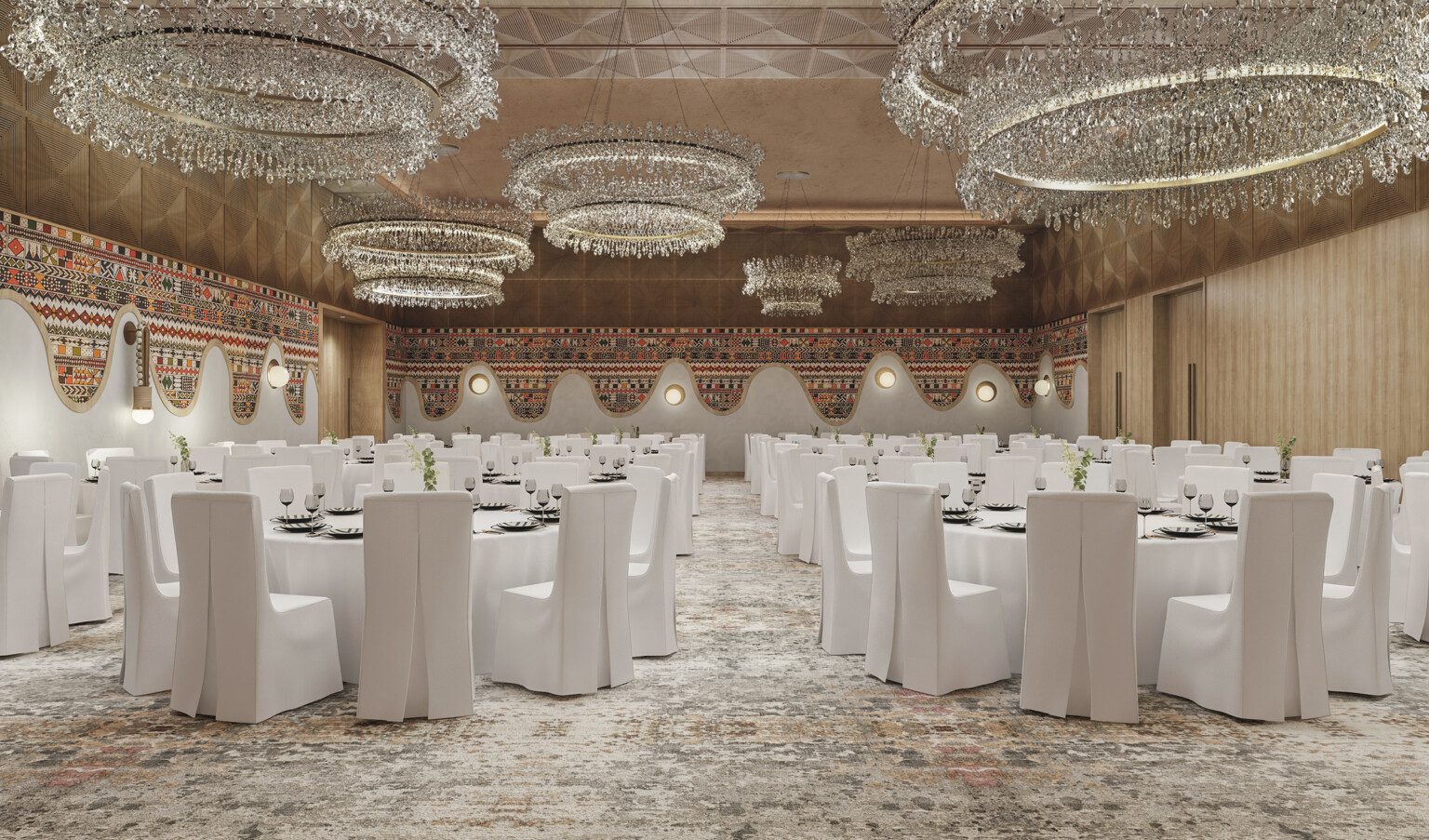 Hotel ballroom with crystal chandeliers, tables with white linens, and white covered chairs