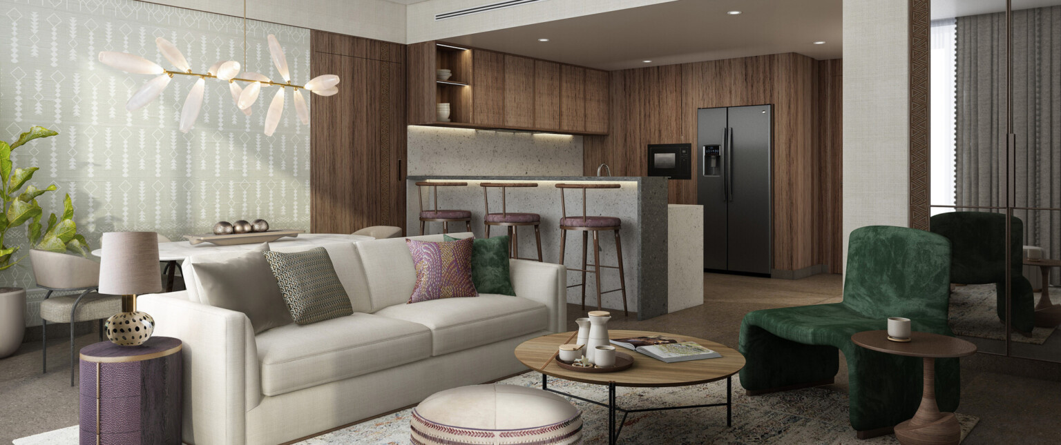 Hotel room showing kitchen and living areas with modern furnishings