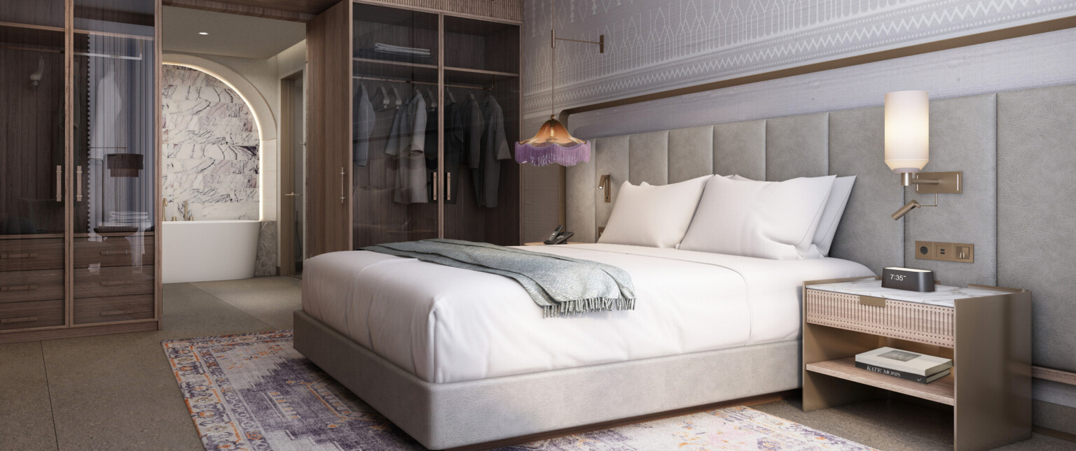 Hotel room featuring modern furnishings with white linens, glass closets, and view of the bathroom