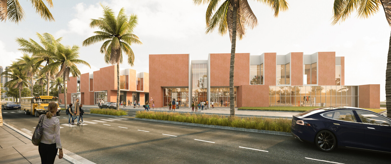 Exterior of two orange buildings with glass windows with a street lined with palm trees and cars