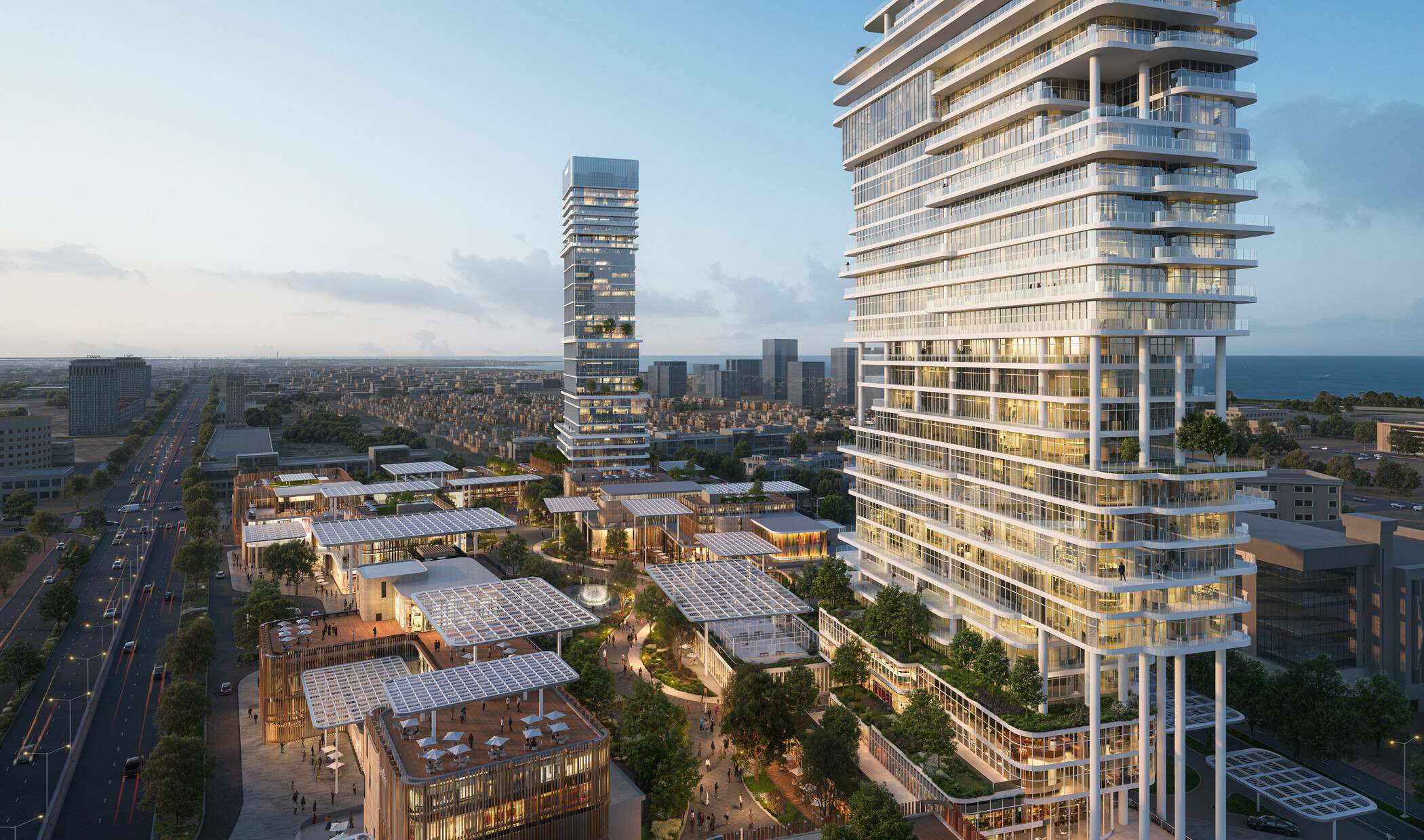 View of SUMOU highlighting the residential tower in the foreground and office tower beyond, overlooking a layered retail podium and landscaped public realm that connects the development at multiple levels.