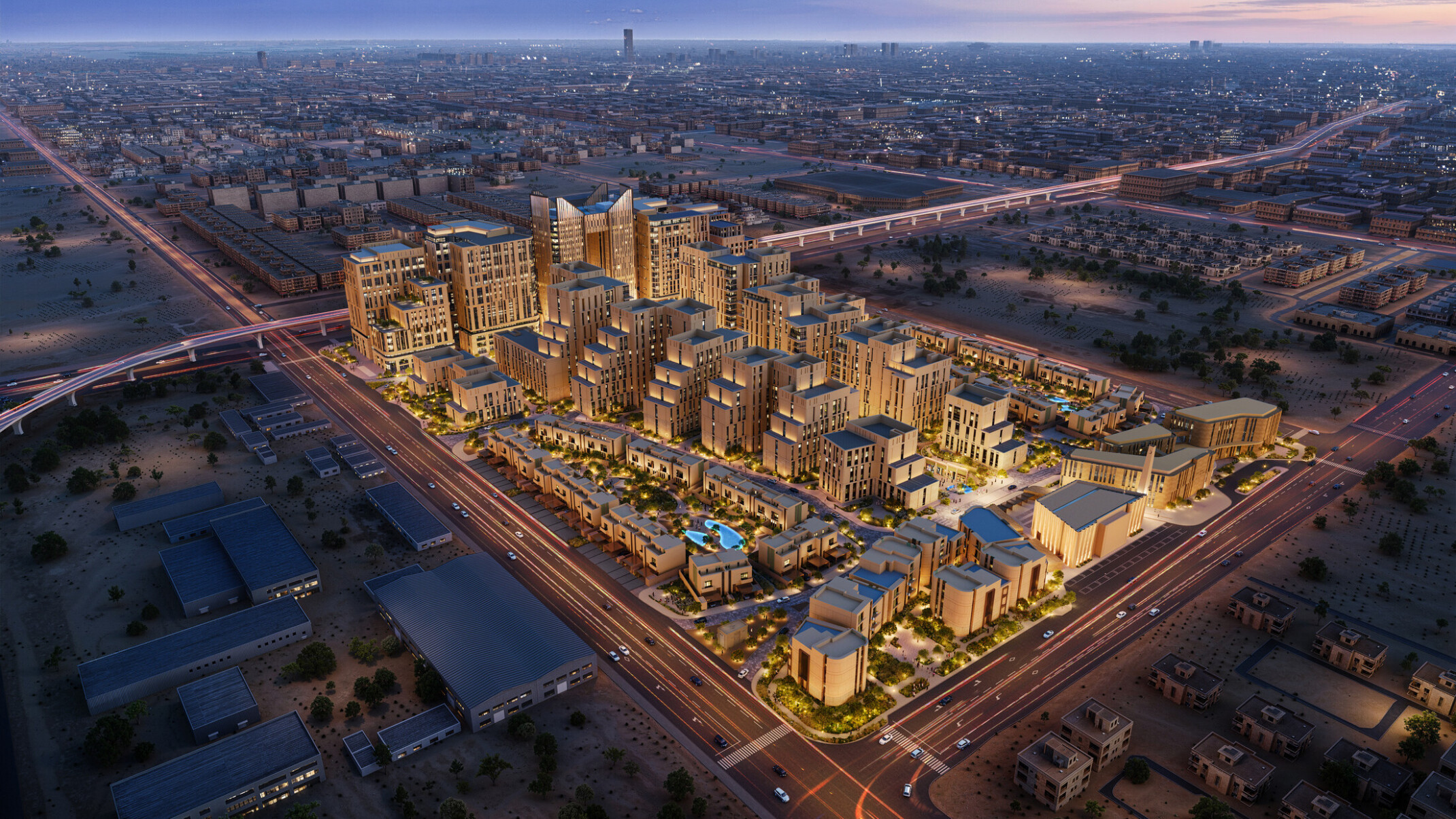 Aerial view of LIWAN Najd in Riyadh, showing a mixed-use community of residential, retail, hospitality, and public spaces connected by landscaped streets and courtyards.