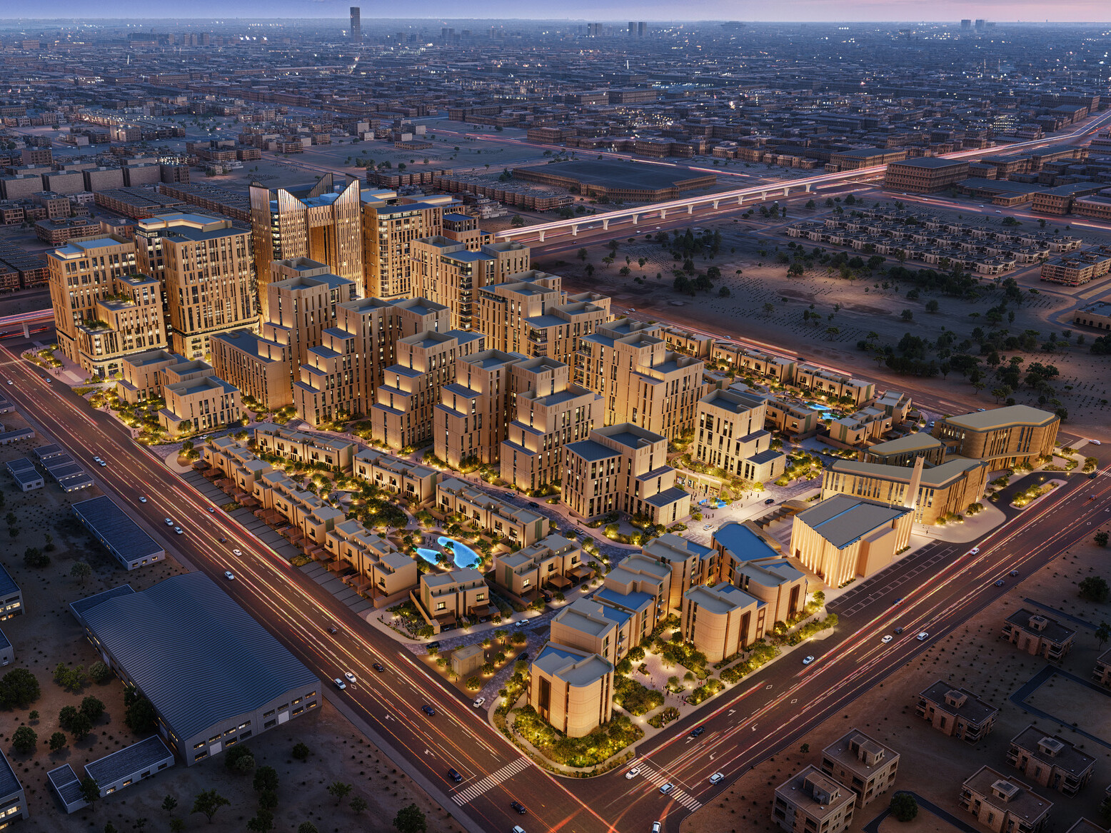 Aerial view of LIWAN Najd in Riyadh, showing a mixed-use community of residential, retail, hospitality, and public spaces connected by landscaped streets and courtyards.