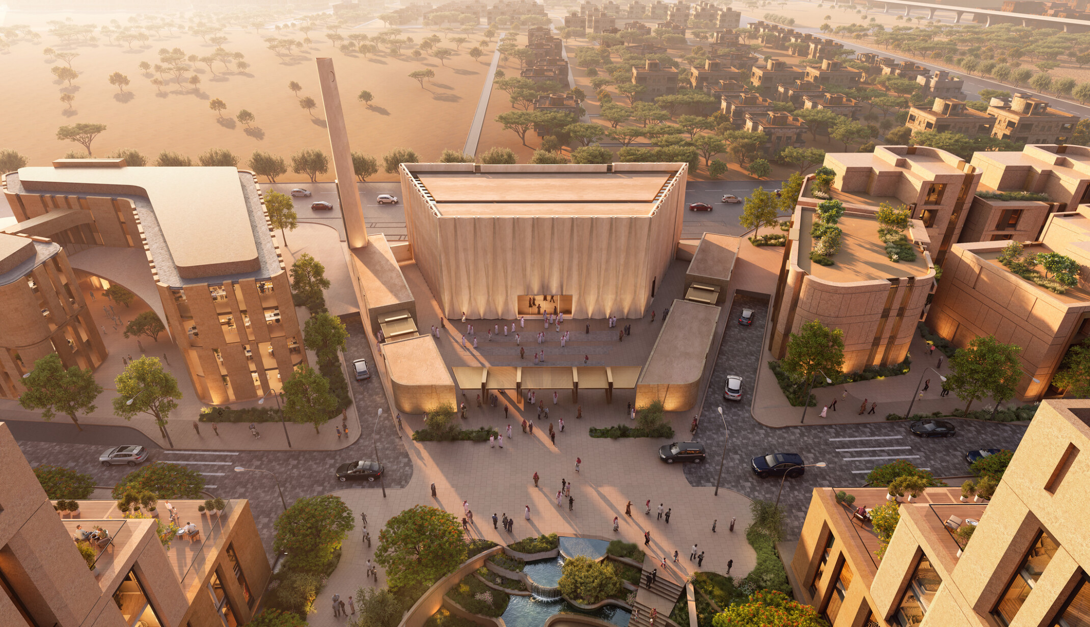Aerial view of the mosque at LIWAN Najd in Riyadh. Archways designed in a contemporary Saudi architectural language with light tan rendering building structures