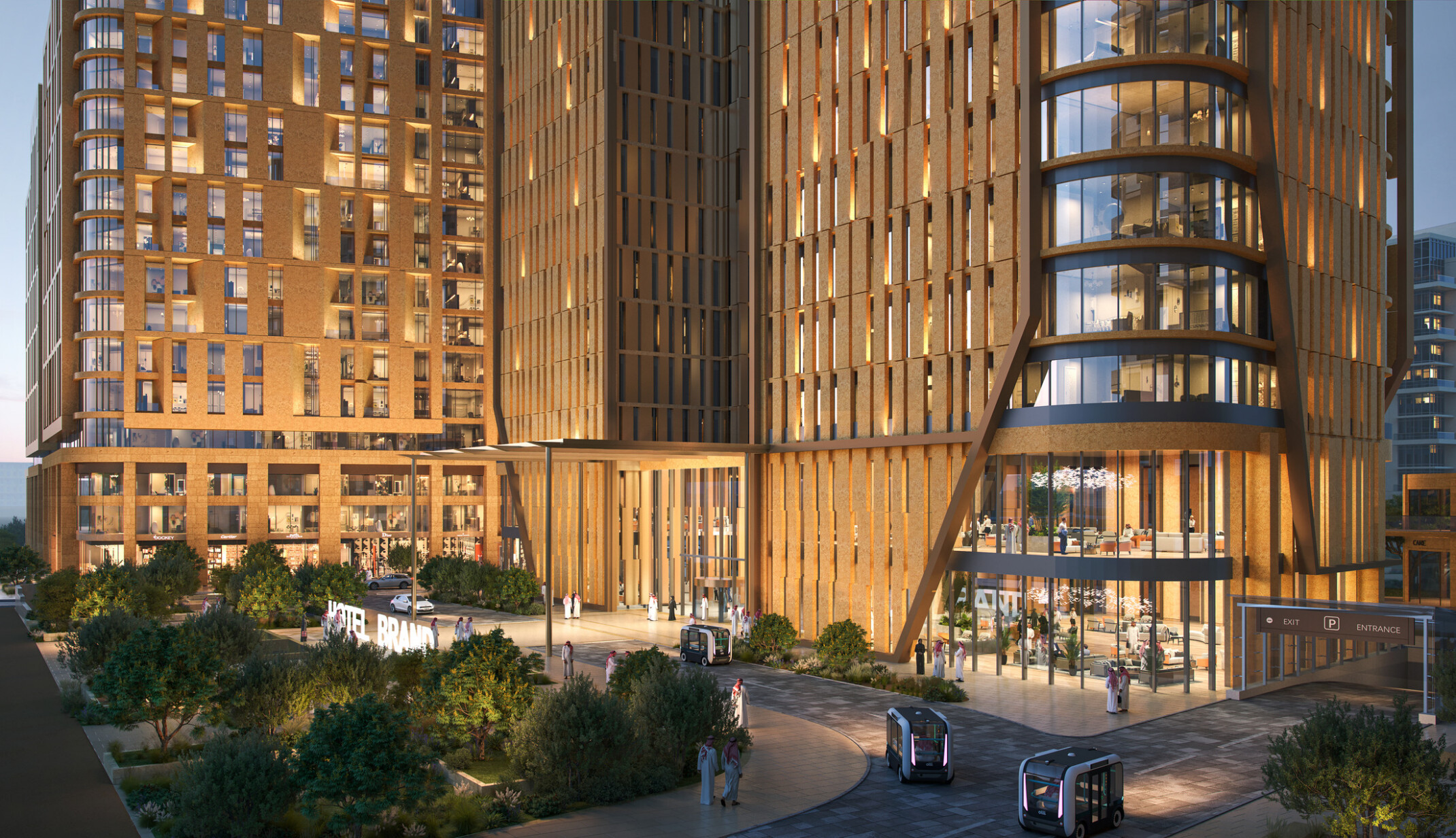 Street-level view of LIWAN Najd in Riyadh, where dense planting, trees, and layered greenery soften the base of the towers, provide shade along pedestrian routes, and create a more comfortable transition between the buildings and public realm