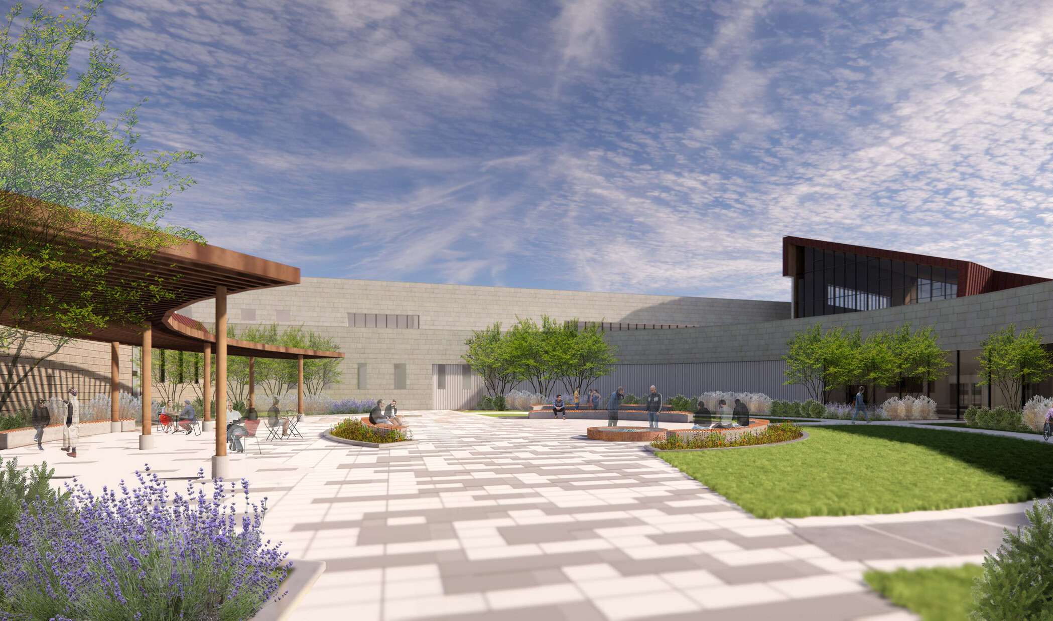Render of a central outdoor courtyard with circular benches, landscaping, a shaded awning with seating, and people gathered throughout.