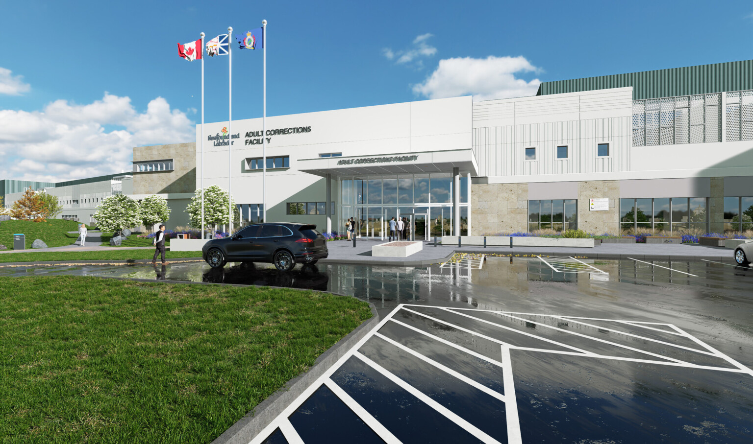 Rendering view from a rain-soaked parking lot of a large two-story building with a mixed-materials façade, many windows of varying size, and a glass entry vestibule.