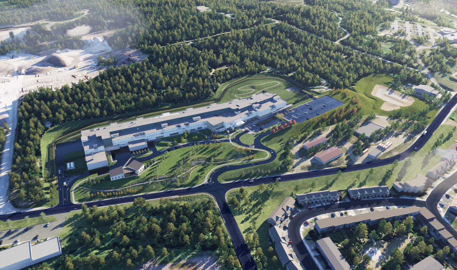 Birds eye view of Newfoundland & Labrador Adult Correctional Facility Replacement Facility; modern white facility surrounded by greenery and forests