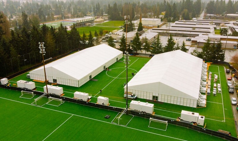COVID 19 pop up facility with tents on soccer field COVID 19 pop up facility with tents on soccer field