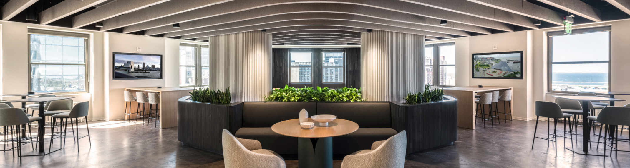 modern office central collaboration space with varied seating for eating and working; DLR Group Cleveland office