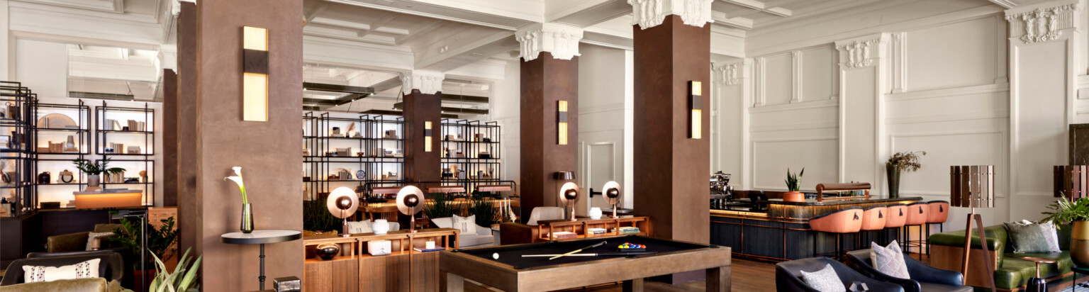 adaptive reuse hotel lobby with elaborate interior decorating