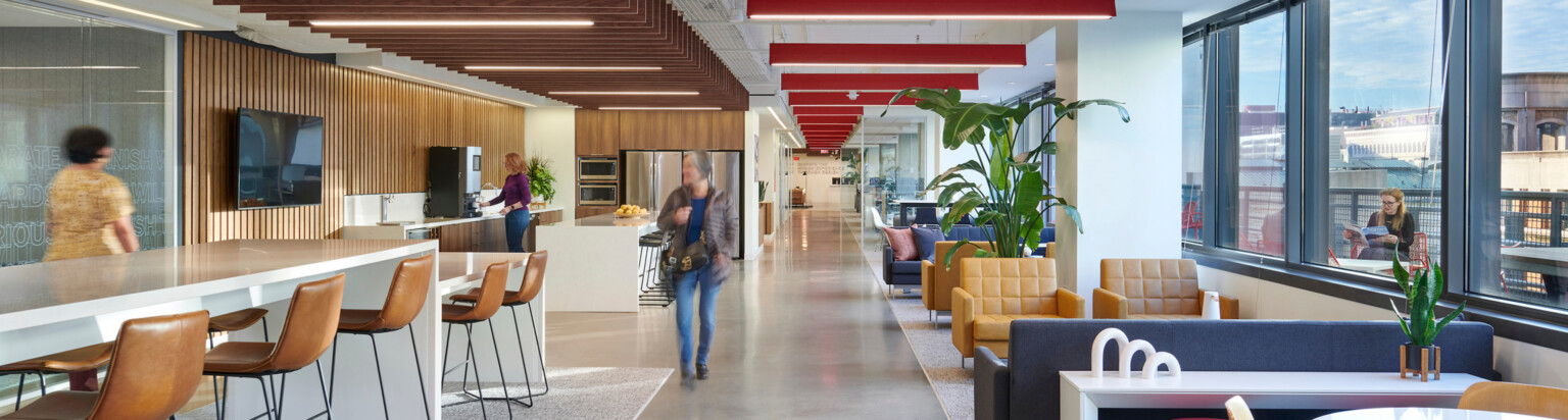 modern office of a major collaboration and gathering hub; modular and tabletop seating; DLR Group Washington, DC office