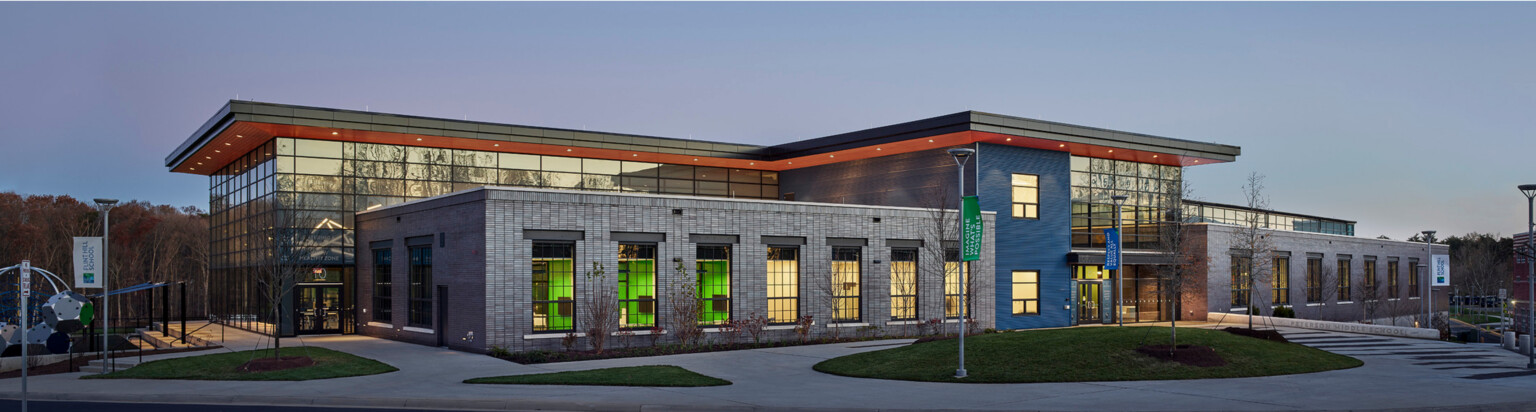 night time view of an independent school, stacked structure