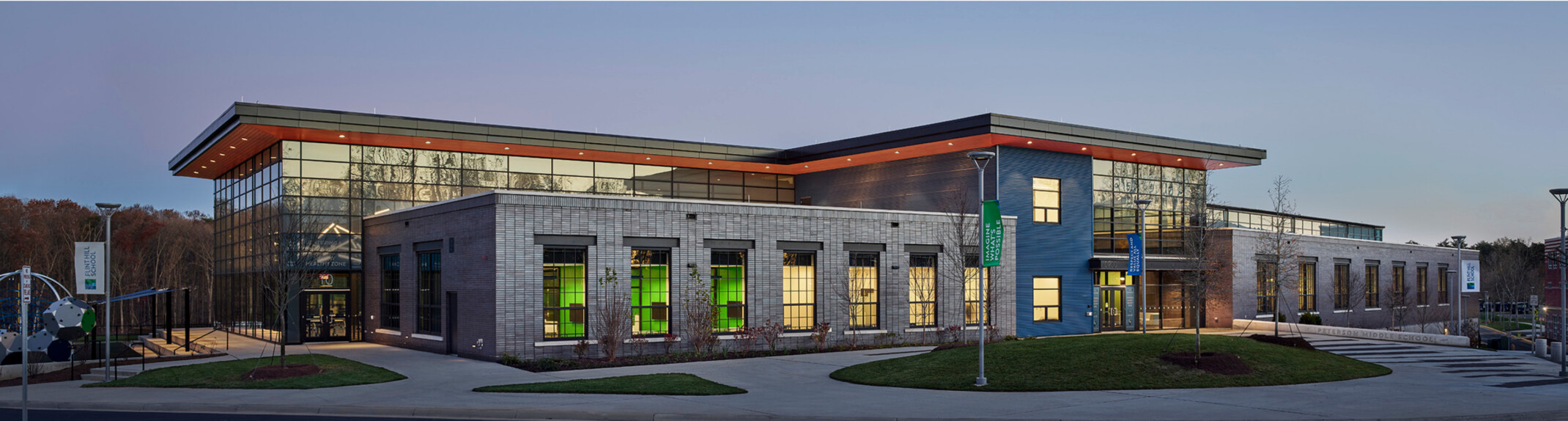 night time view of an independent school, stacked structure