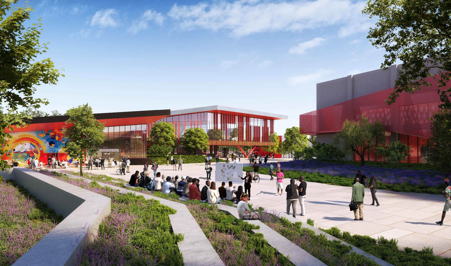 outdoor learning stairs welcome students in Compton; views of the campus with red façade details and art murals create identity