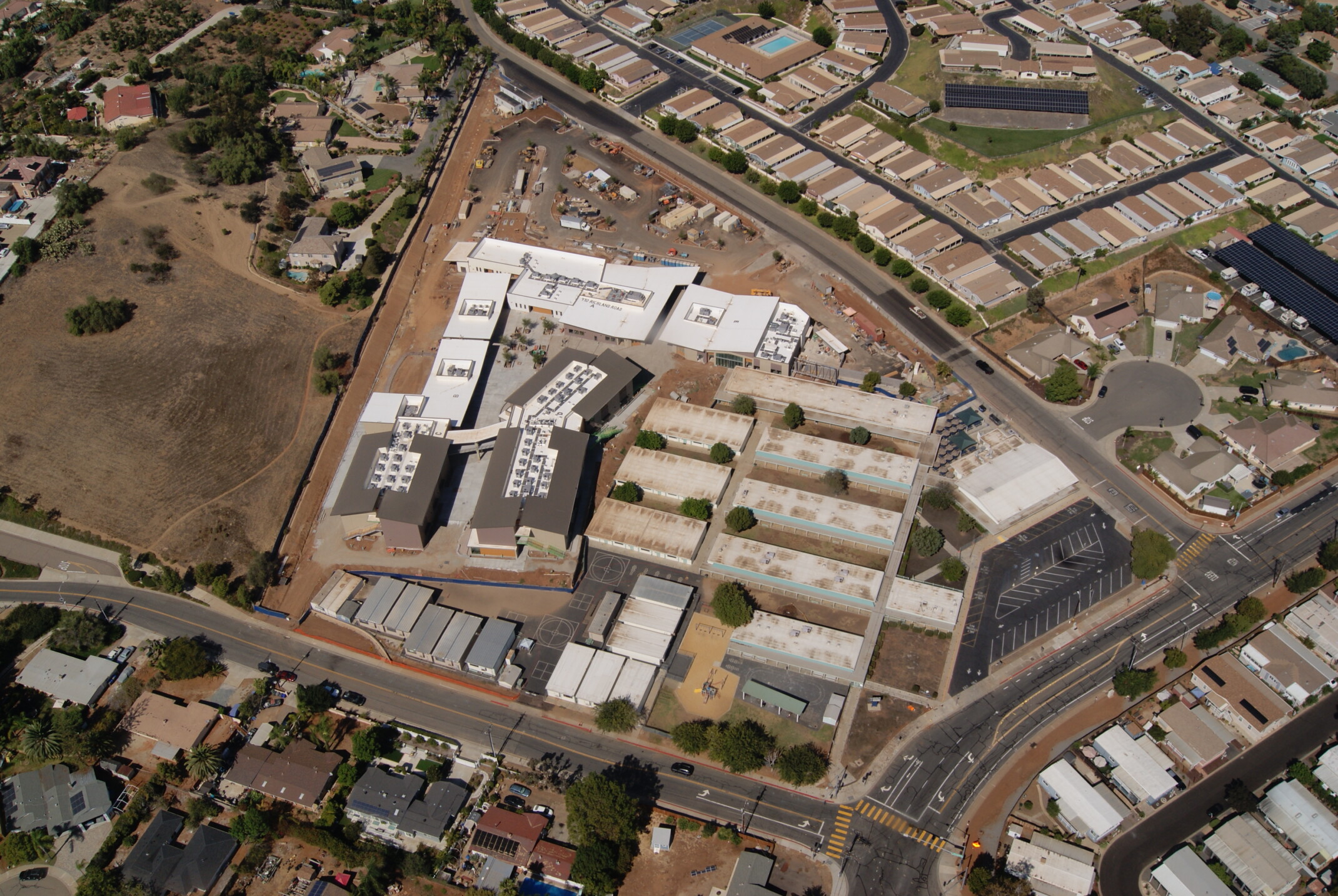 Aerial view of Richland Elementary School site under construction; campus design in the making