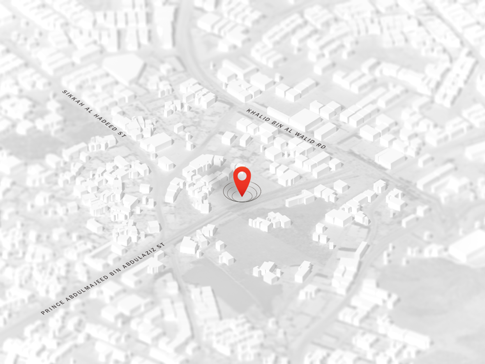 white and gray colored rendering of a city with a red location pinpoint in the middle