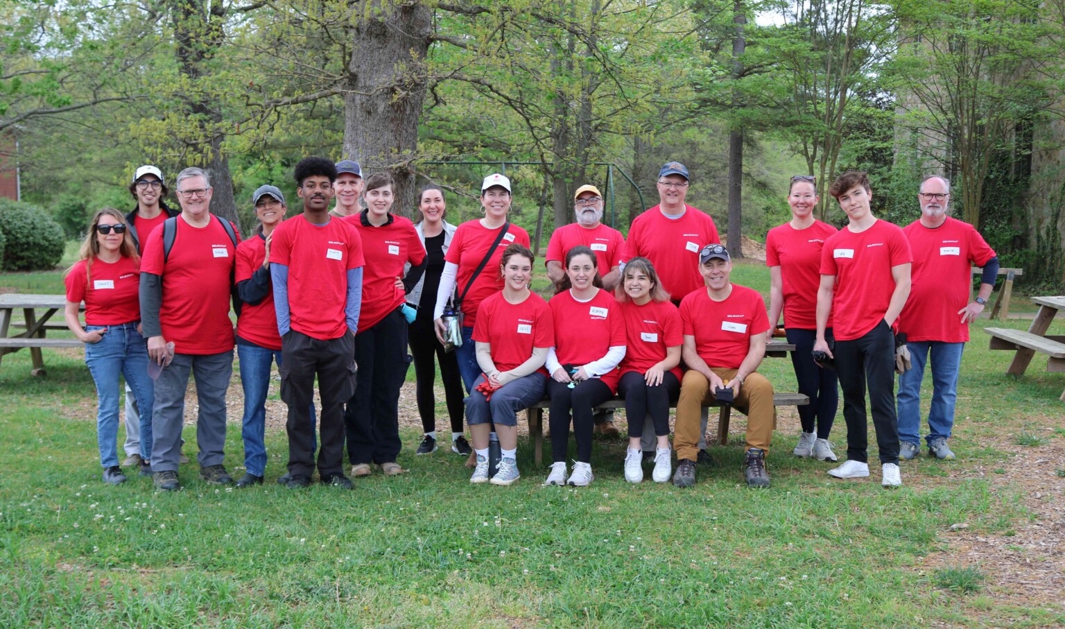 DLR Group employees standing in front of greenspace