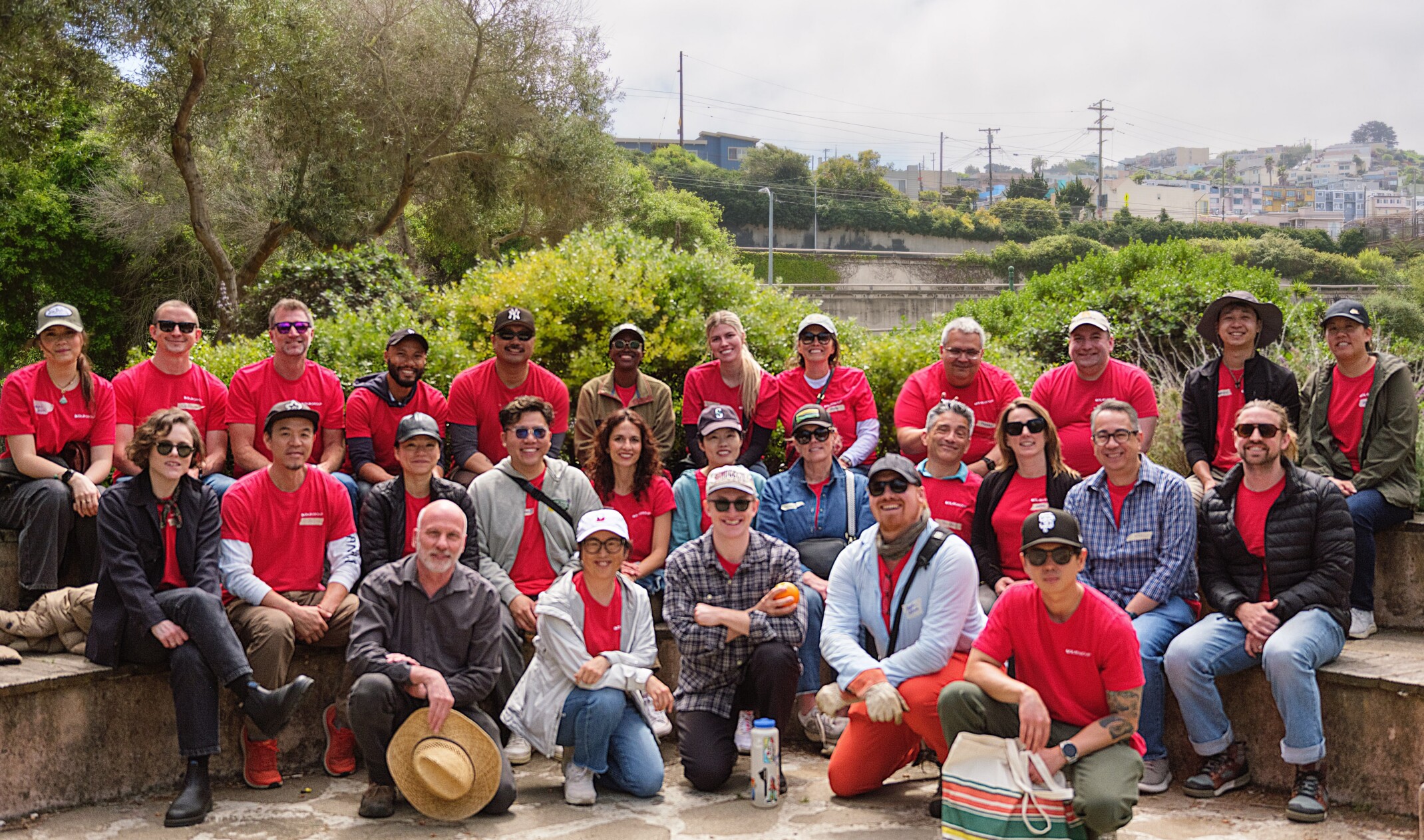 DLR Group employees standing in front of greenspace