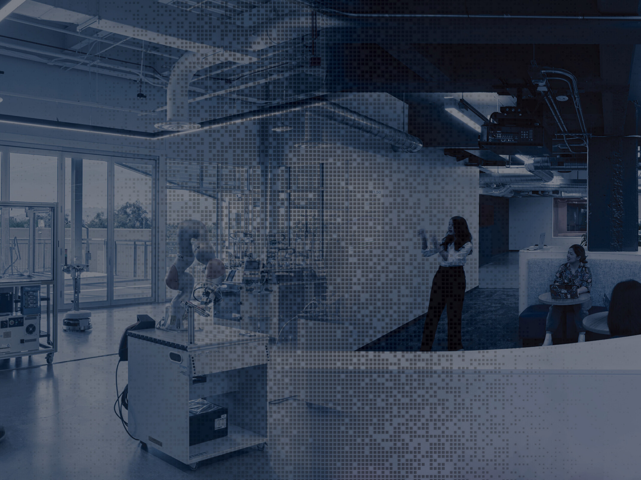 A composite-style image showing a laboratory workspace on the left, with equipment and people working near large windows, all overlaid with a blue pixelated pattern