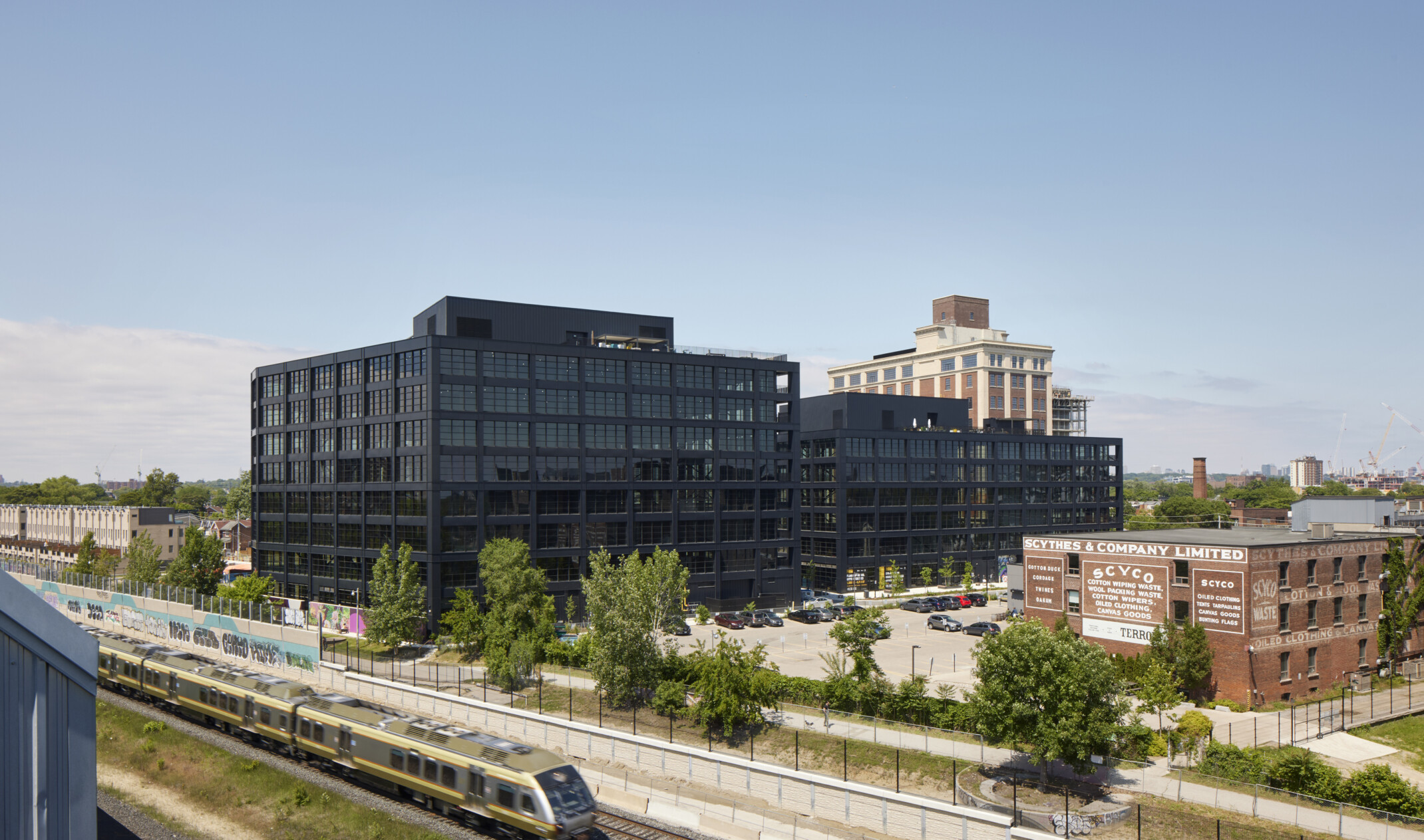 Black steel exterior midrise mass timber building