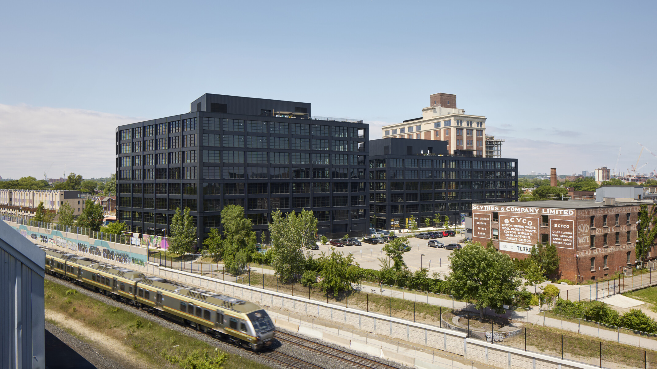 Black steel exterior midrise mass timber building