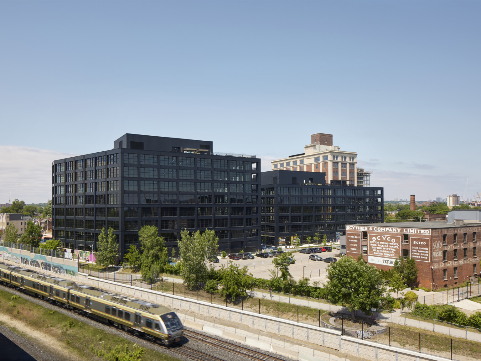 Black steel exterior midrise mass timber building, mass timber buildings, t3 design, mass timber high rise, t3 construction, t3 partners