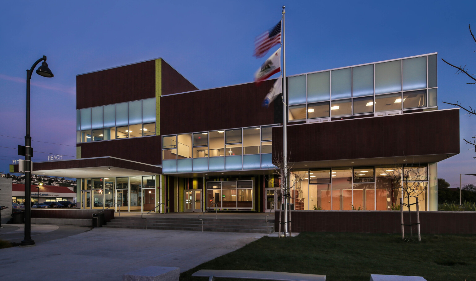 Multistory building with varying facade treatments creating a varied elevation, multiple boxes make up the building form