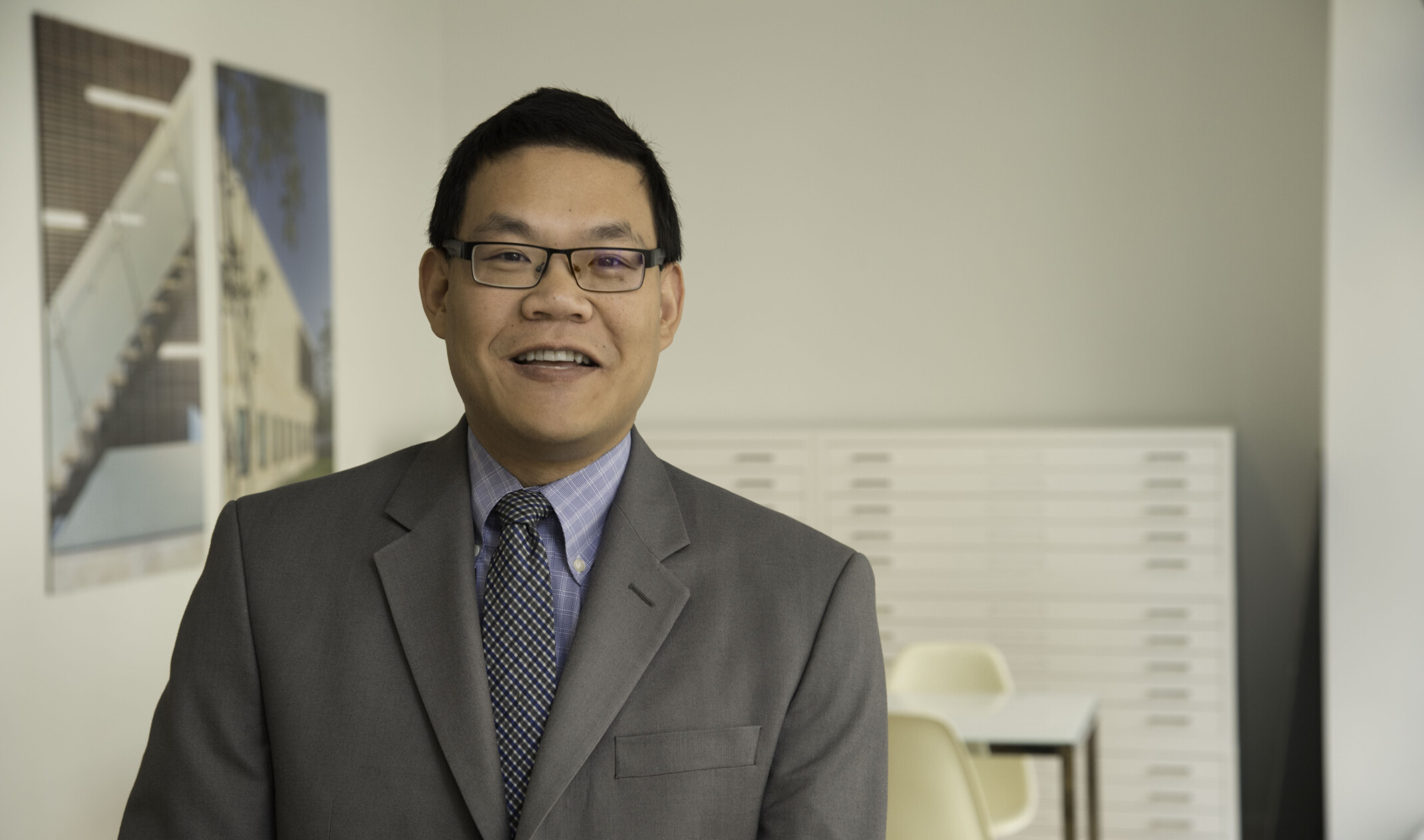 roger chang standing for a portrait