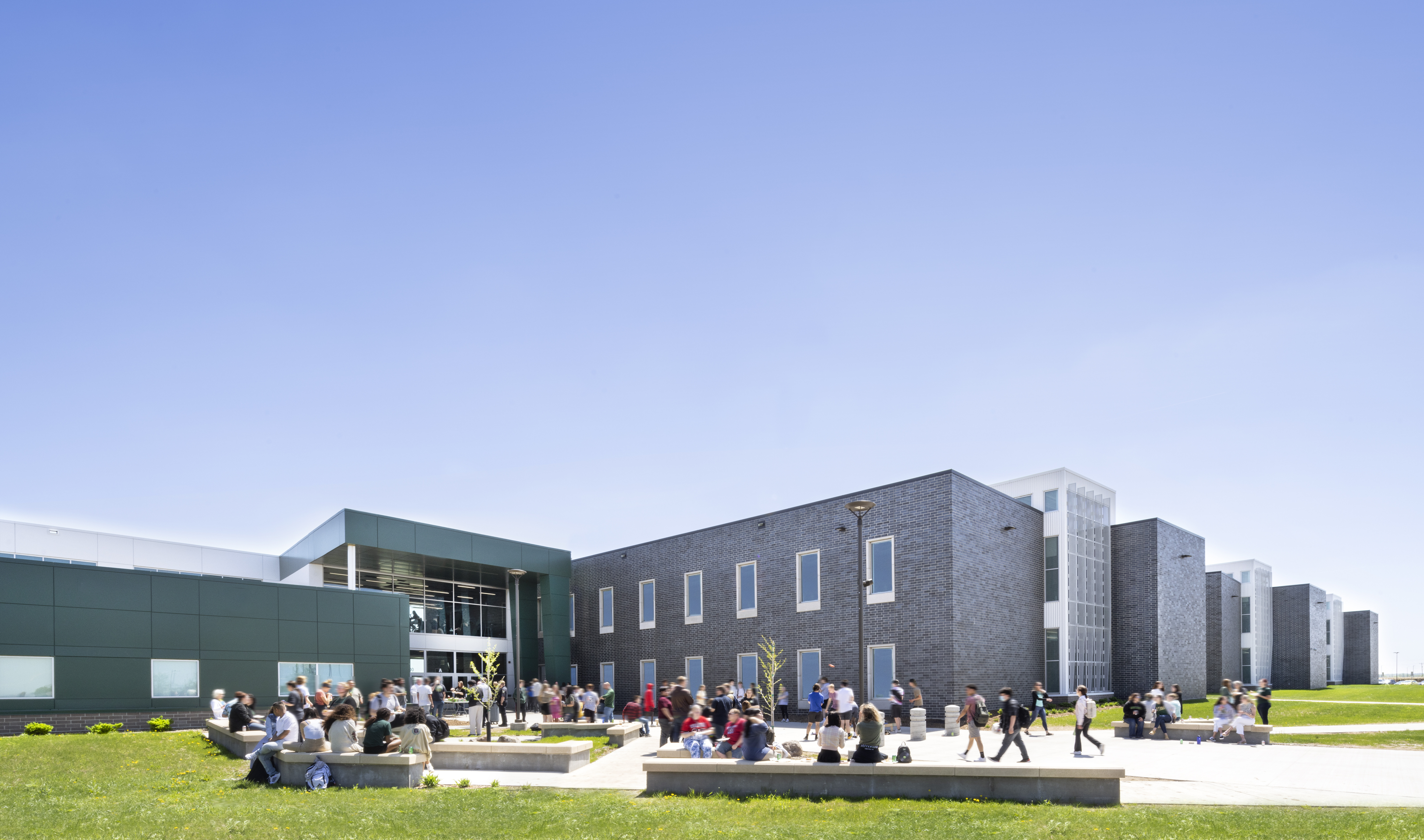 Exterior courtyard of Sioux Falls' Jefferson High School with wrapped facade square entry
