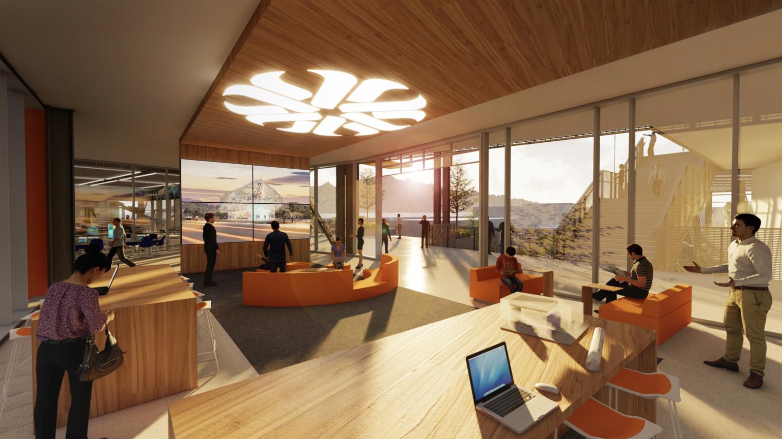 Learning space with flexible and ergonomic seating in white and glass walled room with wood details. Logo illuminated above